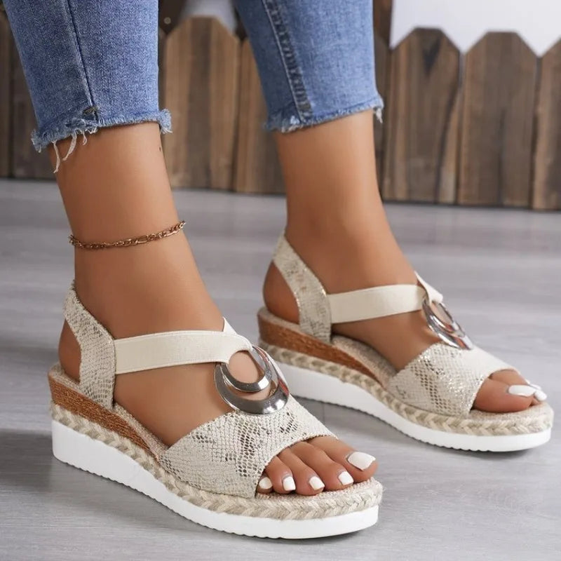 Women's beige platform wedge sandals with open toe and metallic decorative buckle