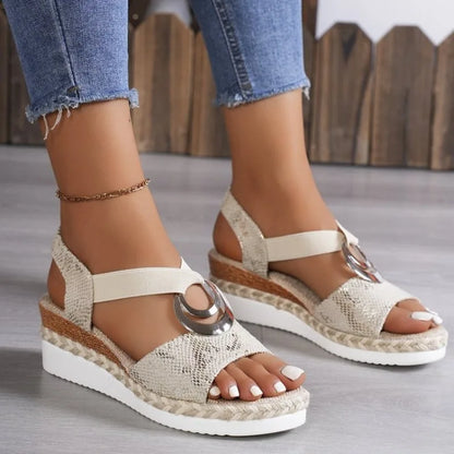 Women's beige platform wedge sandals with open toe and metallic decorative buckle