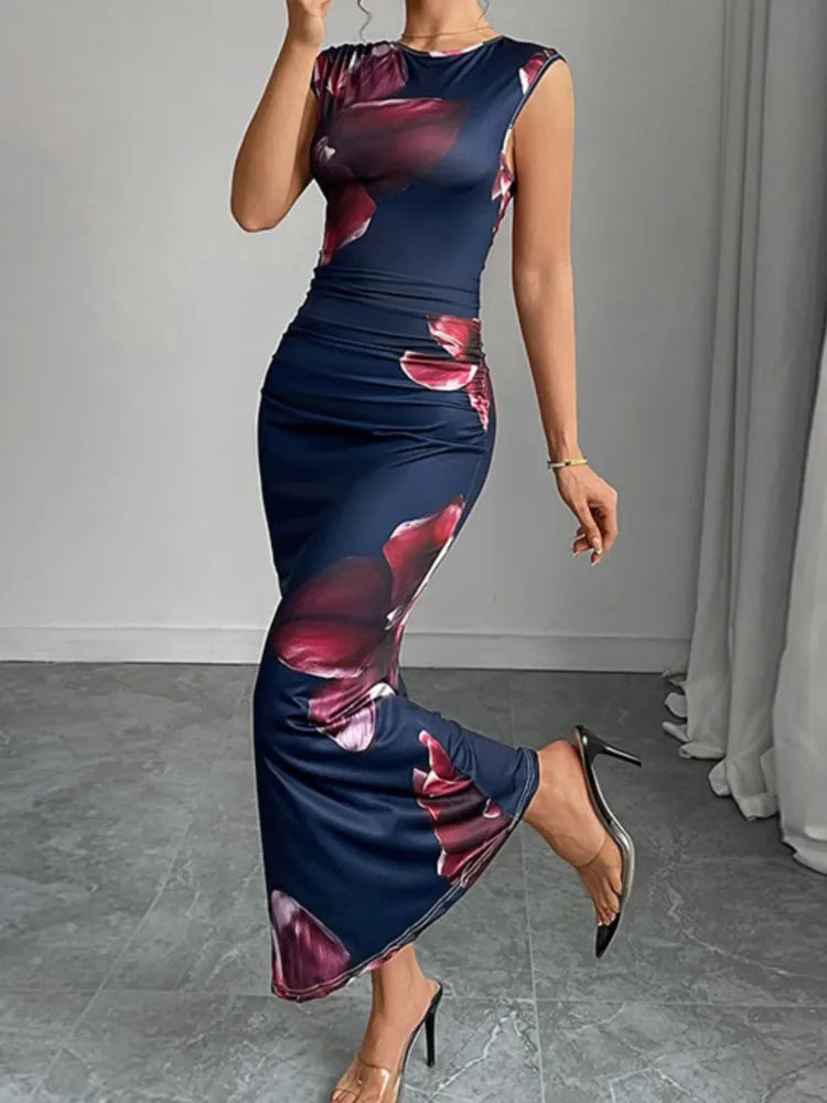 Back view of women’s navy floral print sleeveless maxi dress