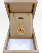 Red rose pendant necklace with gold-tone stainless steel chain and sparkling circular floral pendant
